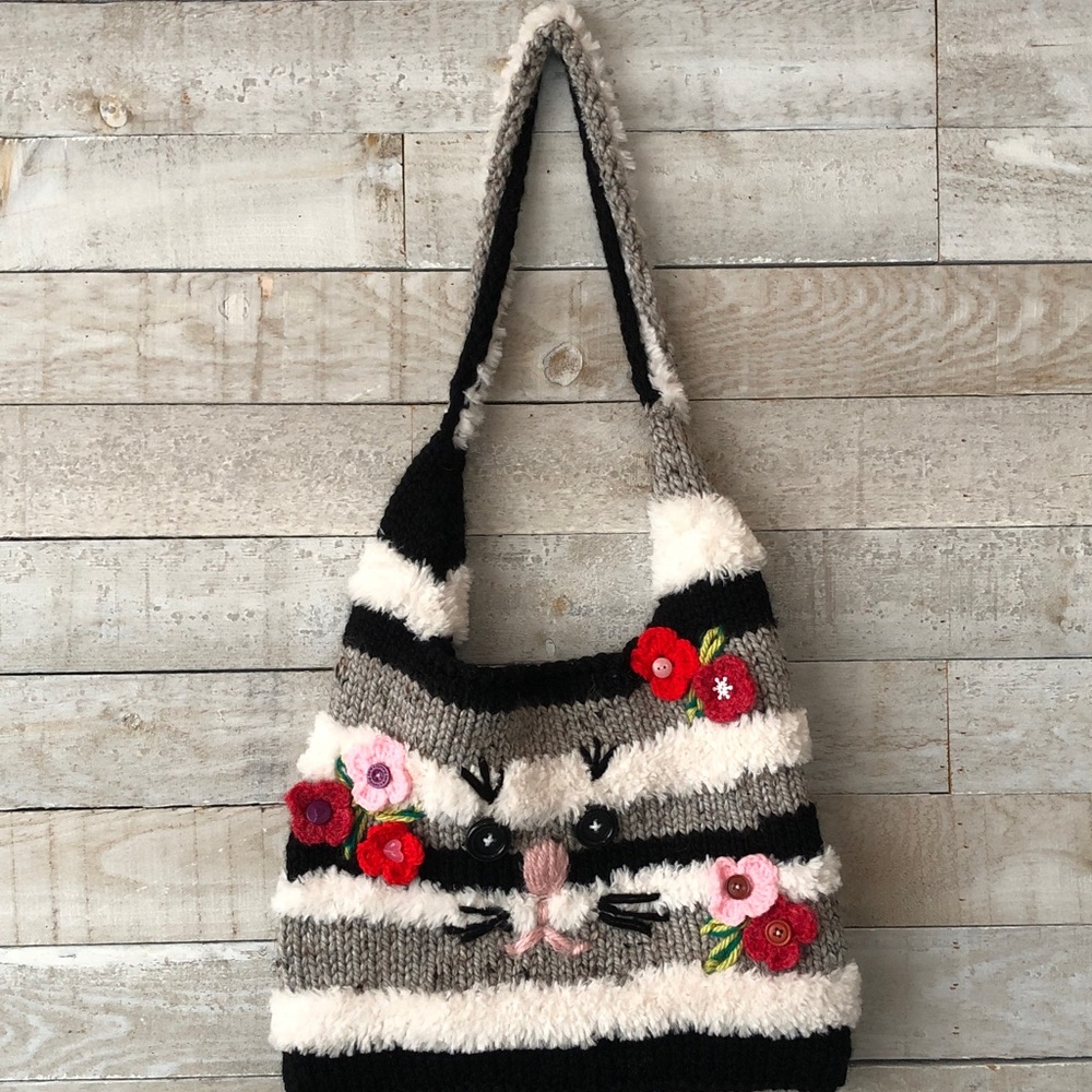 Anthromorphic hand crafted knit shoulder bag
